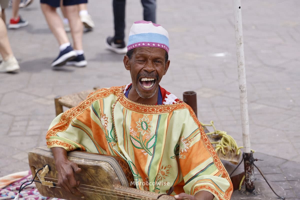 Gnaoua musicians performing with traditional instruments in Essaouira