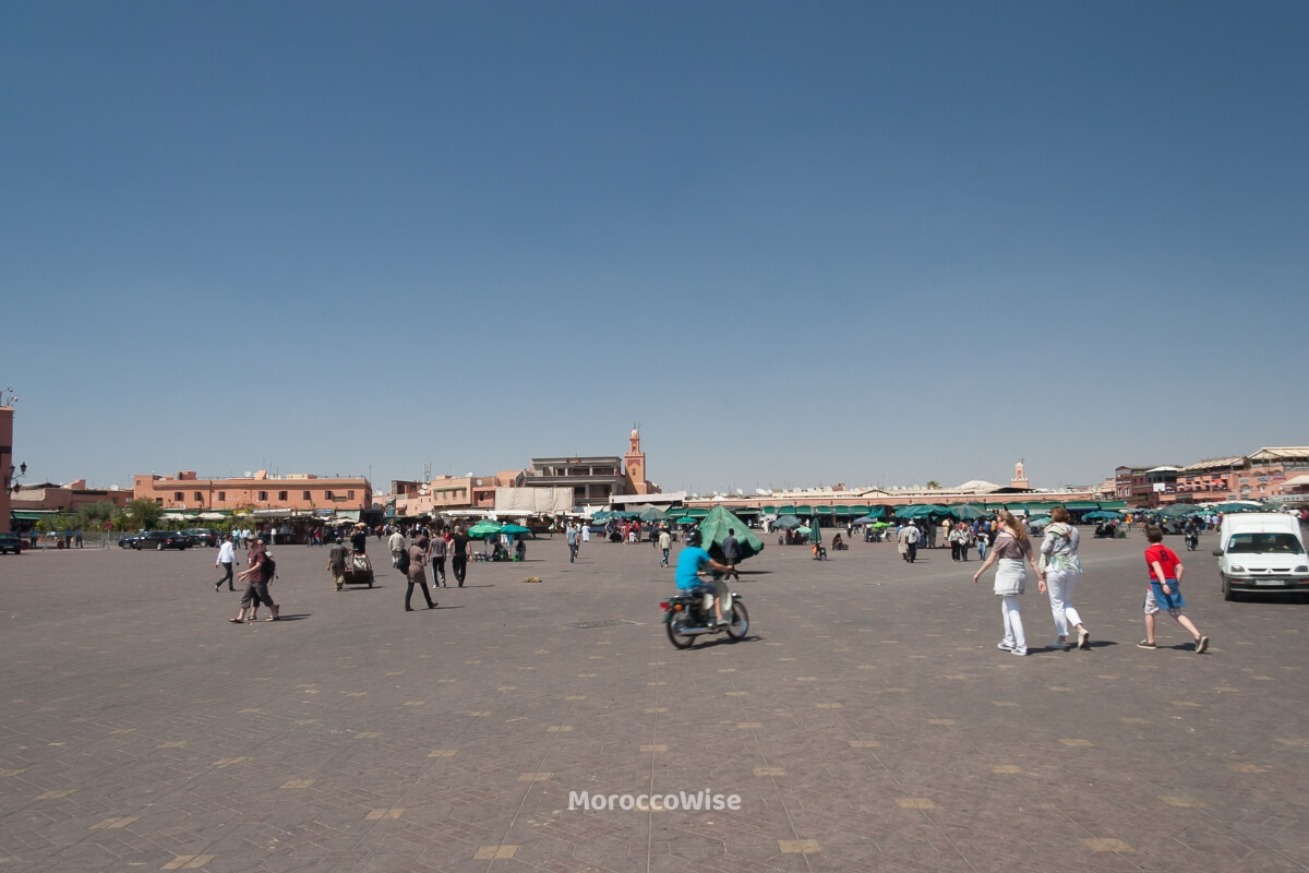 Traditional performers and visitors gathering in the square
